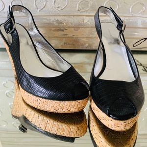 Black snakeskin wicker wedges
